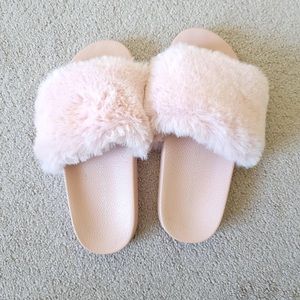 Kendall and Kylie faux fur slides.